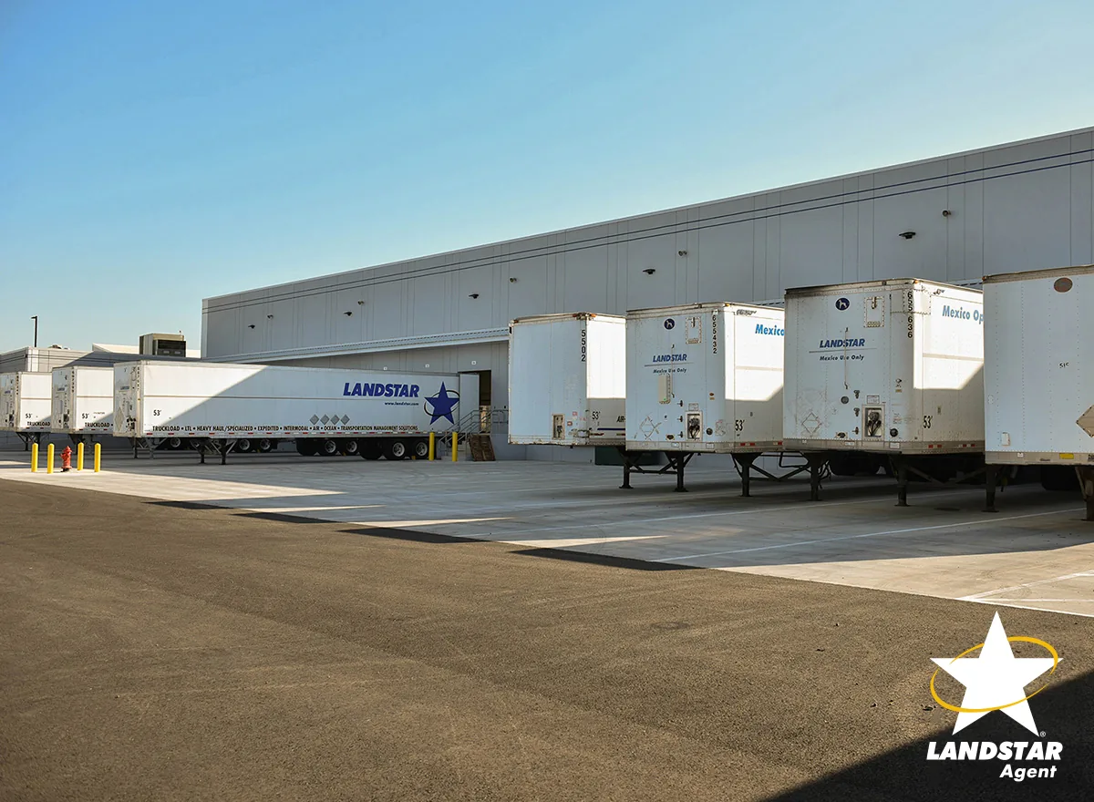 Cross-dock with trailers consolidating LTL freight.